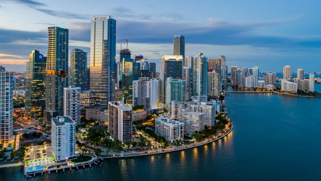 White semi-truck driving on highway — reasons to come to miami-for your cdl